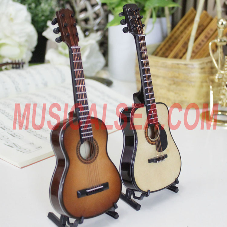 miniature wooden guitar